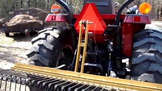 Tractor With Pine Needle Rake from Everything Attachments Vid001 [upl. by Kallista321]