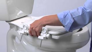 How to Install Toilet Seat  Easy•Clean amp Change™ with STATITE® Seat Fastening System™ Flip Cap [upl. by Garrard389]